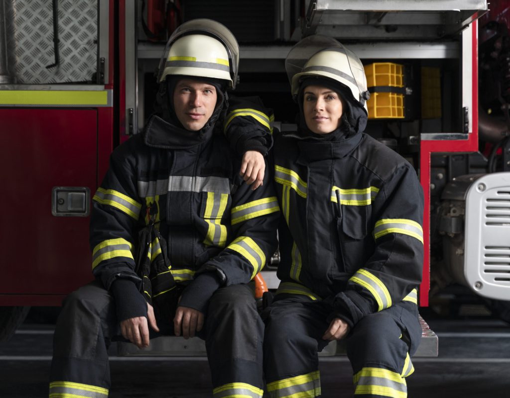 male-female-firefighters-working-together-suits-helmets